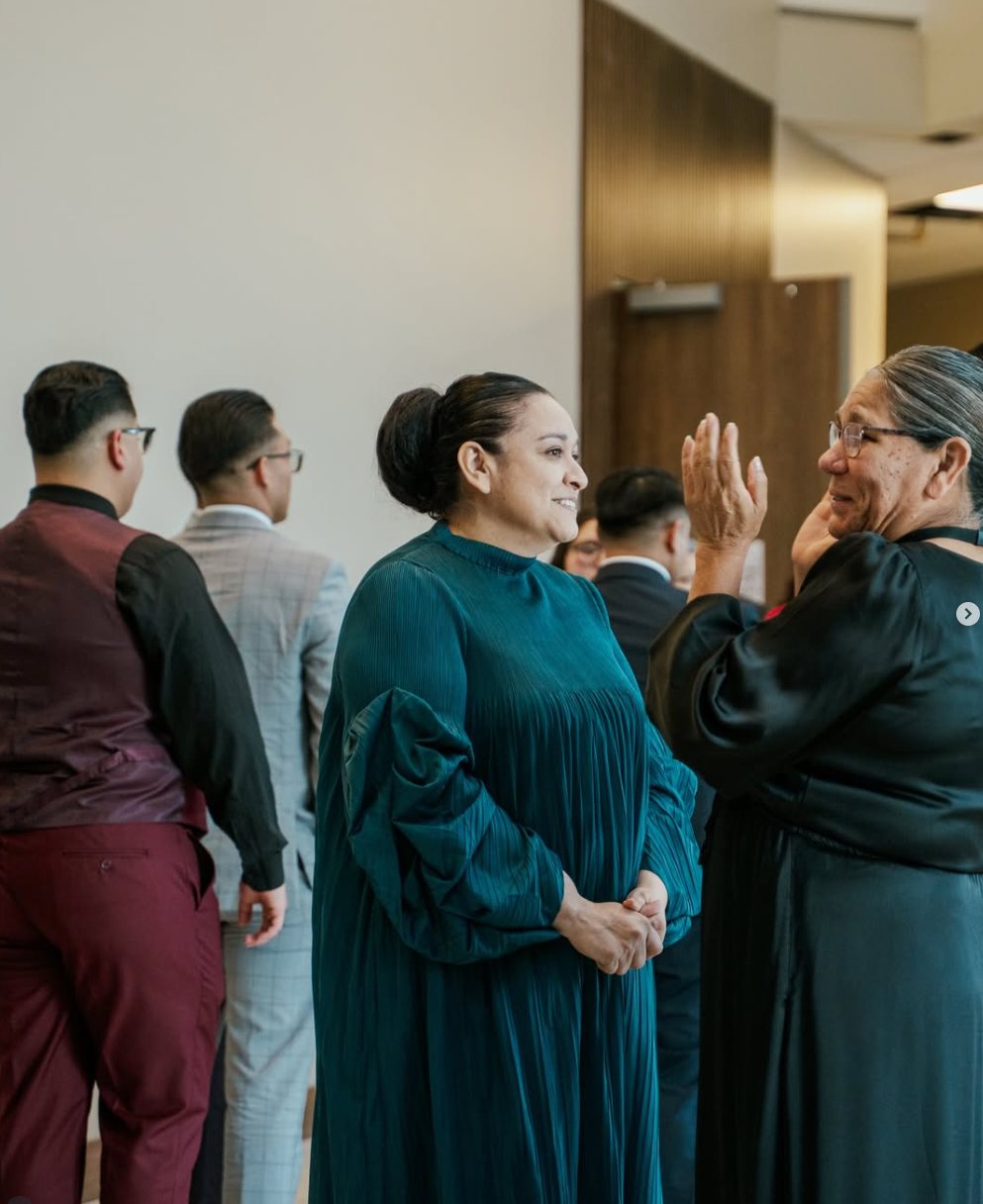 People laughing and connecting in community at CLFC