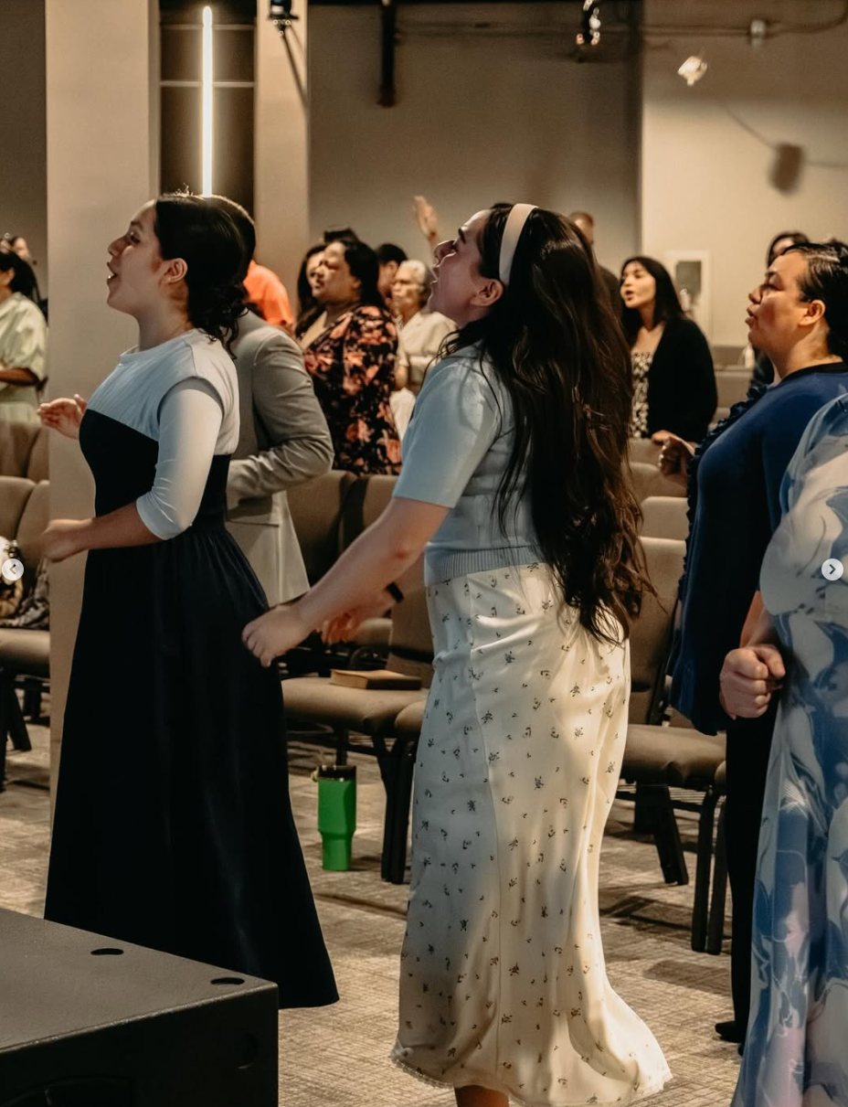 Women worshipping together at CLFC