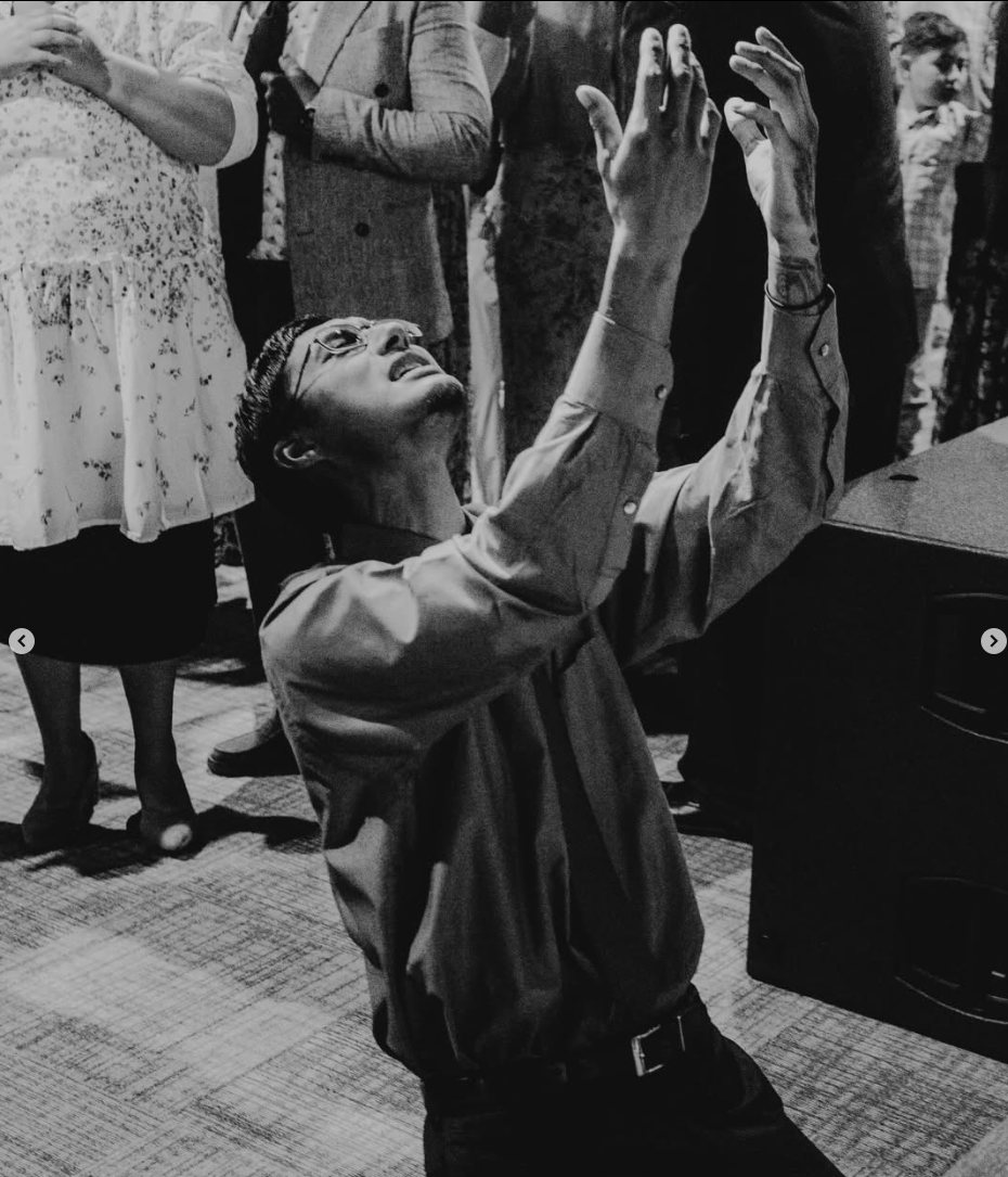 A quiet worship response at the altar