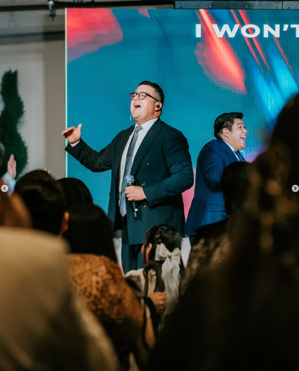 Worship leader singing at CLFC